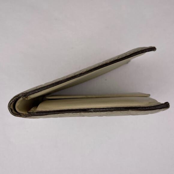 Gucci Ivory Monogram Leather Bifold Wallet - Picture 11 of 12